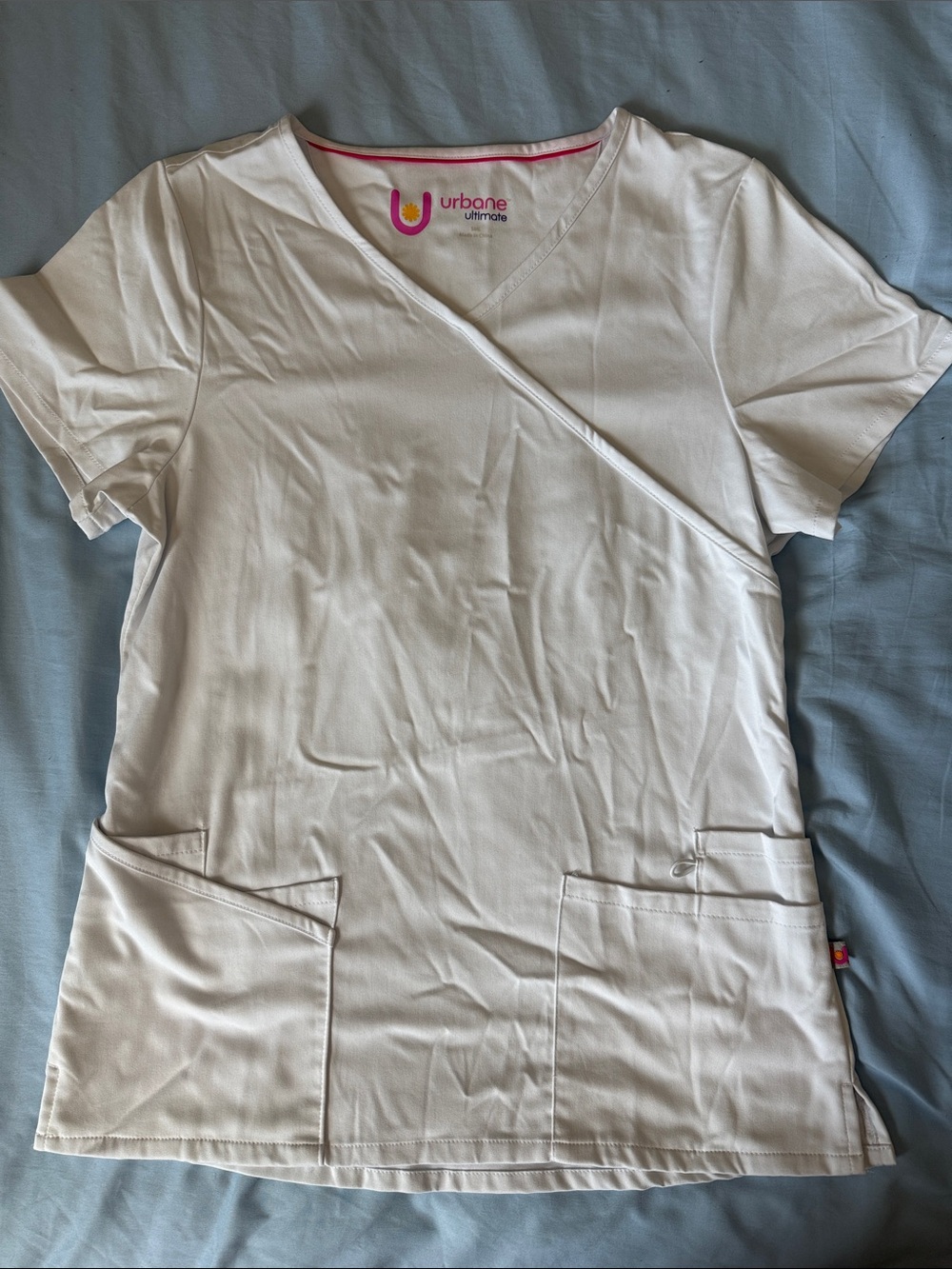 Urbane White Scrub Top with Pink Logo Detail